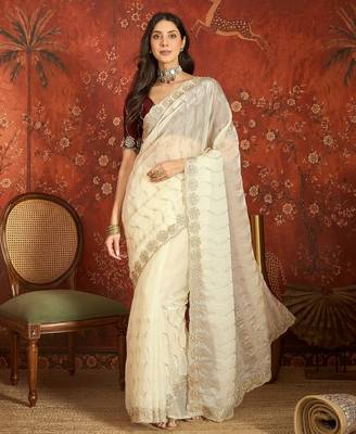 Cream tissue embroidered saree with unstitched blouse piece. 2