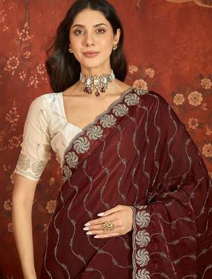 Maroon tissue embroidered saree with unstitched blouse piece. 4