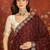 Maroon tissue embroidered saree with unstitched blouse piece.