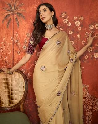 Beige silk blend embroidered saree with unstitched blouse piece. 1
