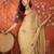 Beige silk blend embroidered saree with unstitched blouse piece.