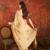 Beige silk blend embroidered saree with unstitched blouse piece.