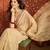Beige chiffon embroidered saree with unstitched blouse piece.