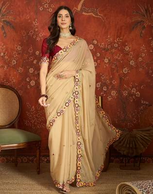 Beige chiffon embroidered saree with unstitched blouse piece. 1