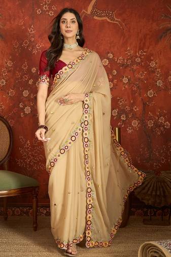 Beige chiffon embroidered saree with unstitched blouse piece.