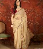 Beige chiffon embroidered saree with unstitched blouse piece.