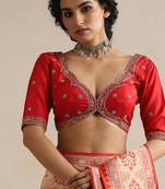 Red embroidered silk blouse