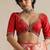 Red embroidered silk blouse