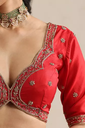 Red embroidered silk blouse