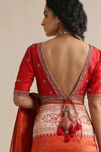 Red embroidered silk blouse