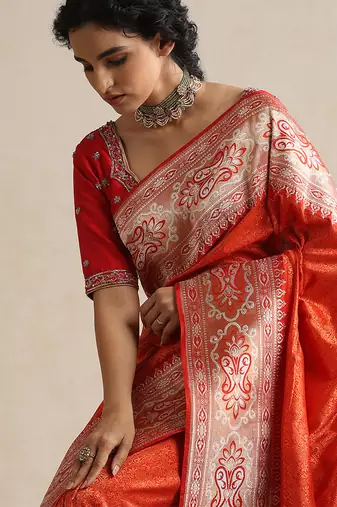 Red embroidered silk blouse