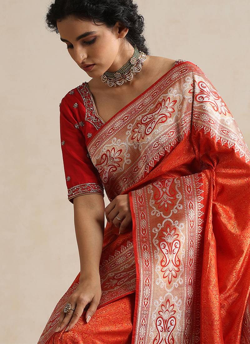 Red embroidered silk blouse