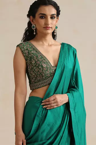 Emerald green embroidered silk blouse