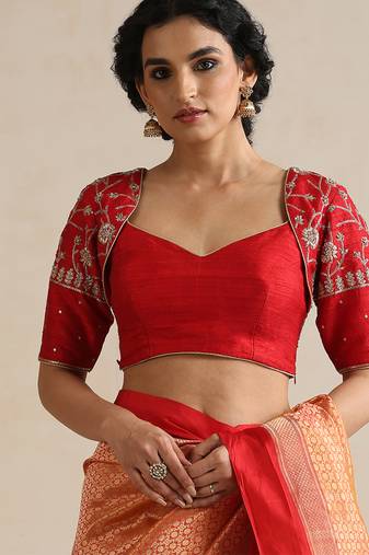 Red embroidered silk blouse