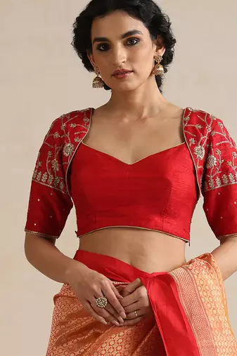 Red embroidered silk blouse