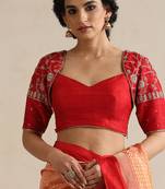 Red embroidered silk blouse