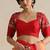 Red embroidered silk blouse