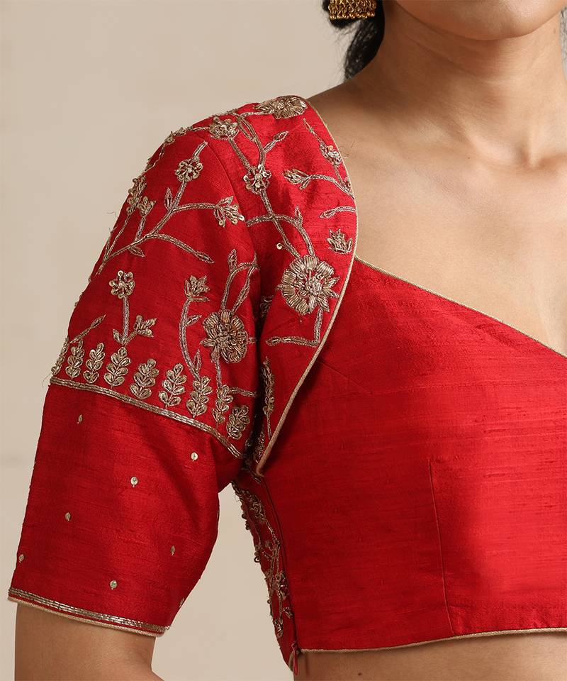 Red embroidered silk blouse