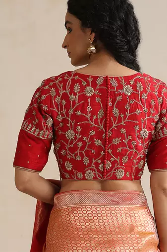 Red embroidered silk blouse