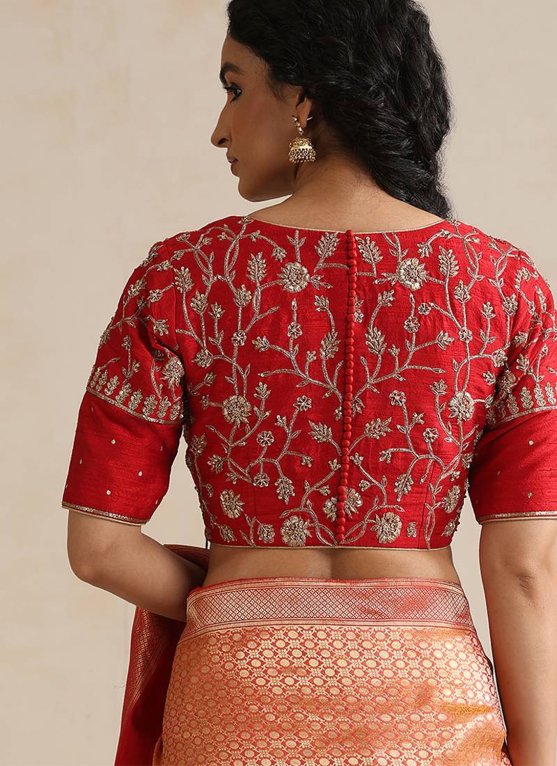 Red embroidered silk blouse