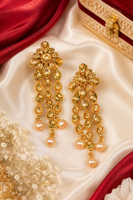 Floral kundan and leaf drop earrings 1