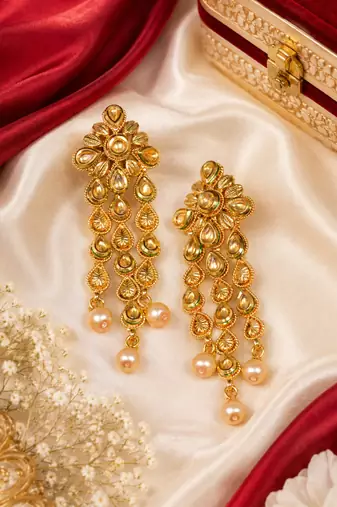 Floral kundan and leaf drop earrings