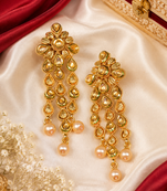 Floral kundan and leaf drop earrings