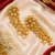 Dangler kundan and gold leaf long earrings