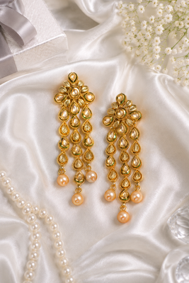 Floral kundan and leaf drop earrings 2