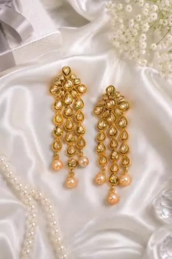 Floral kundan and leaf drop earrings