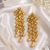 Floral kundan and leaf drop earrings
