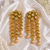 Gold plated textured coin kundan earrings