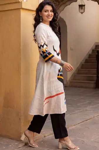 Women Printed Regular Kurta with Trousers