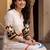 Women Printed Regular Kurta with Trousers