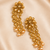 Dangler kundan and gold leaf long earrings