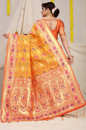 Mustard yellow patola silk blend saree with blouse piece