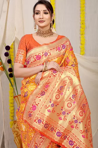 Mustard yellow patola silk blend saree with blouse piece