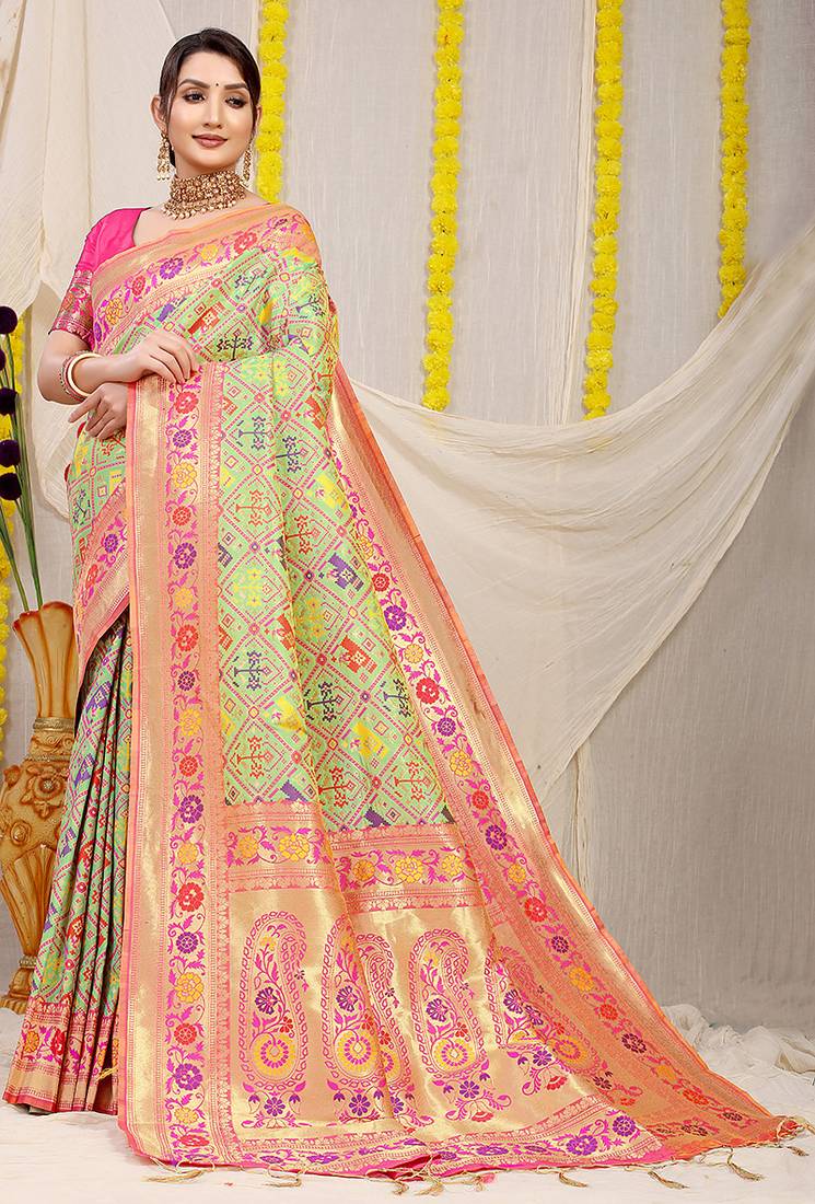 Mint green patola silk blend saree with blouse piece