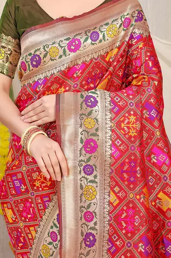 Red patola silk blend saree with blouse piece