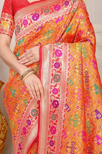 Orange patola silk blend saree with blouse piece