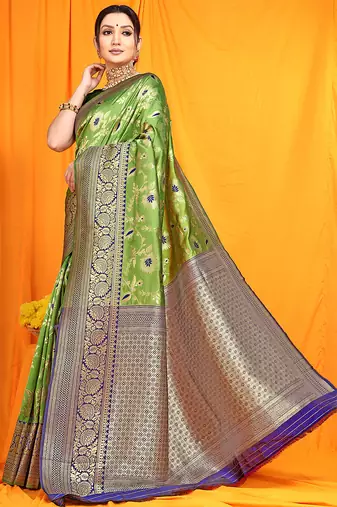 Light green banarasi silk blend saree with zari woven border
