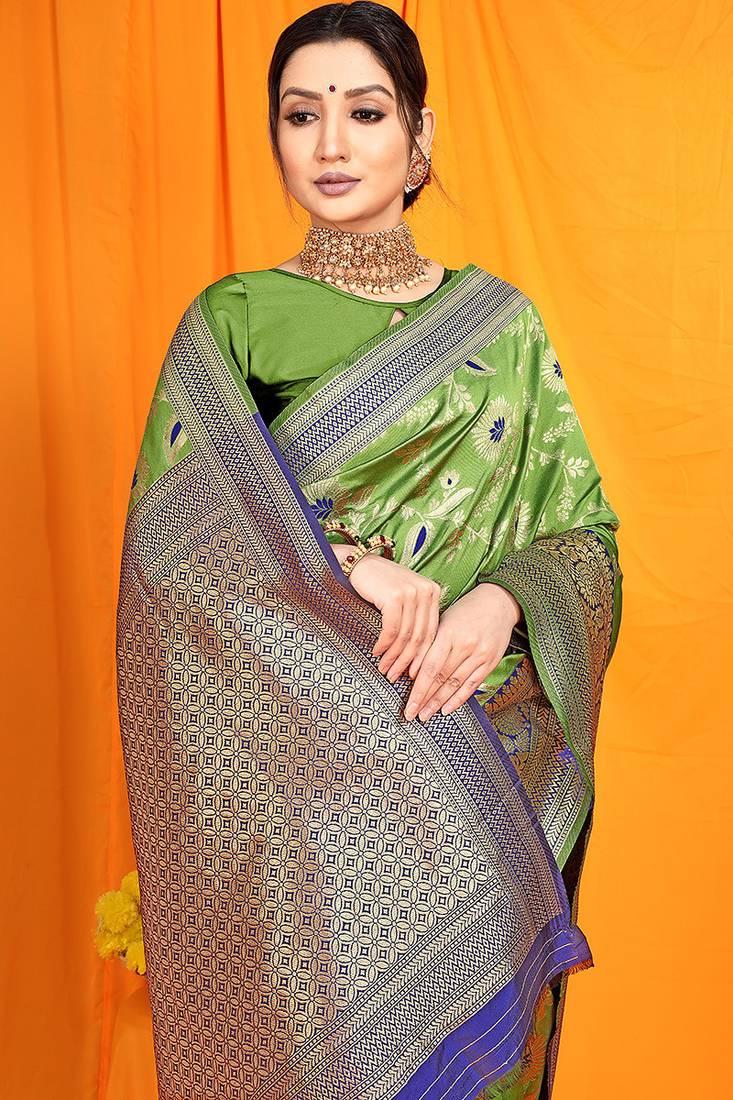 Light green banarasi silk blend saree with zari woven border