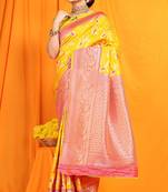 Yellow banarasi silk blend saree with zari woven border