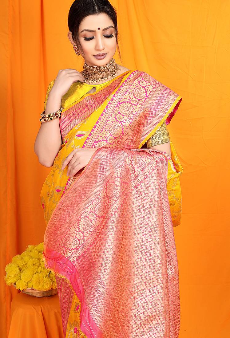 Yellow banarasi silk blend saree with zari woven border