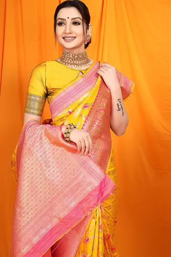 Yellow banarasi silk blend saree with zari woven border