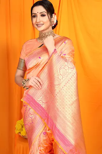 Peach banarasi silk blend saree with zari woven border