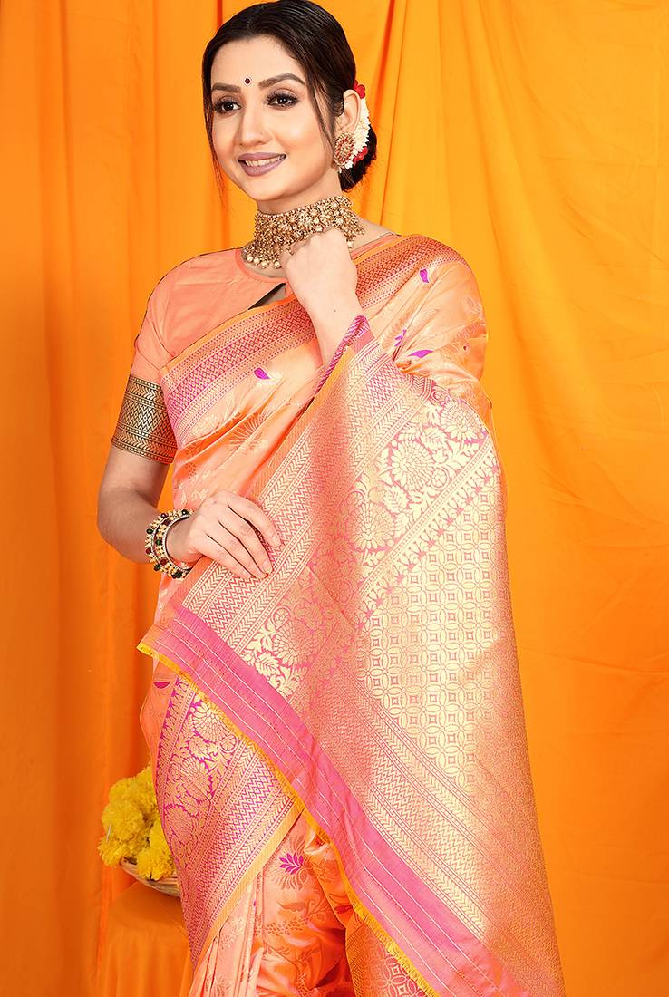 Peach banarasi silk blend saree with zari woven border