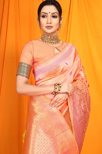 Peach banarasi silk blend saree with zari woven border
