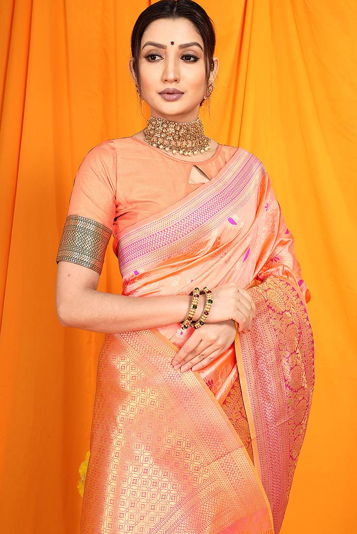 Peach banarasi silk blend saree with zari woven border
