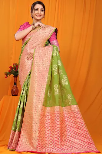 Light green banarasi silk blend saree with pink zari woven border